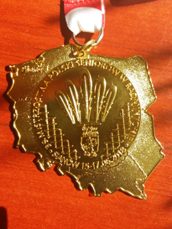 Złoty medal - awers